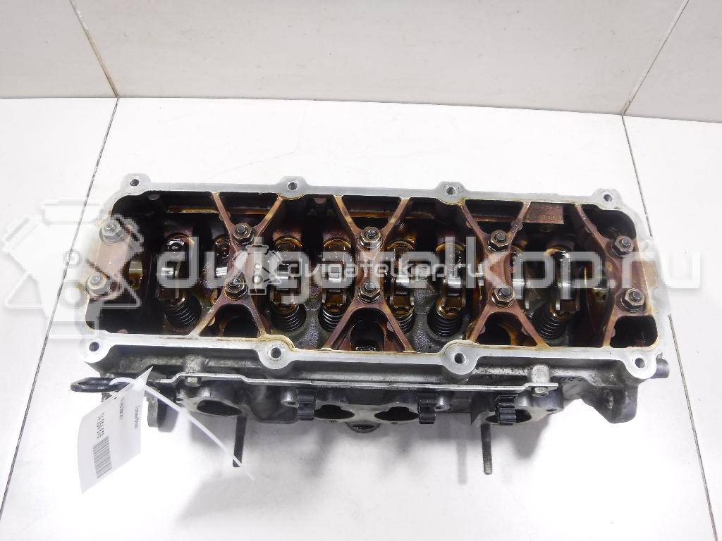 Фото Головка блока для двигателя BFQ для Volkswagen Bora / Golf 102 л.с 8V 1.6 л бензин 06B103351F {forloop.counter}}