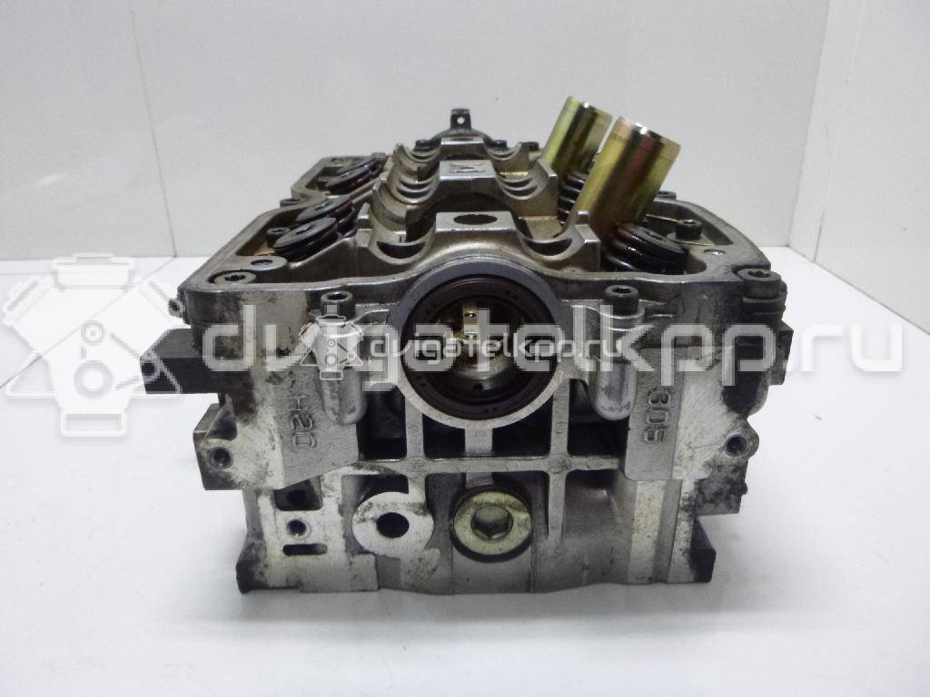 Фото Головка блока для двигателя EJ20 (Turbo) для Subaru Impreza 211-250 л.с 16V 2.0 л бензин 11039AB430 {forloop.counter}}