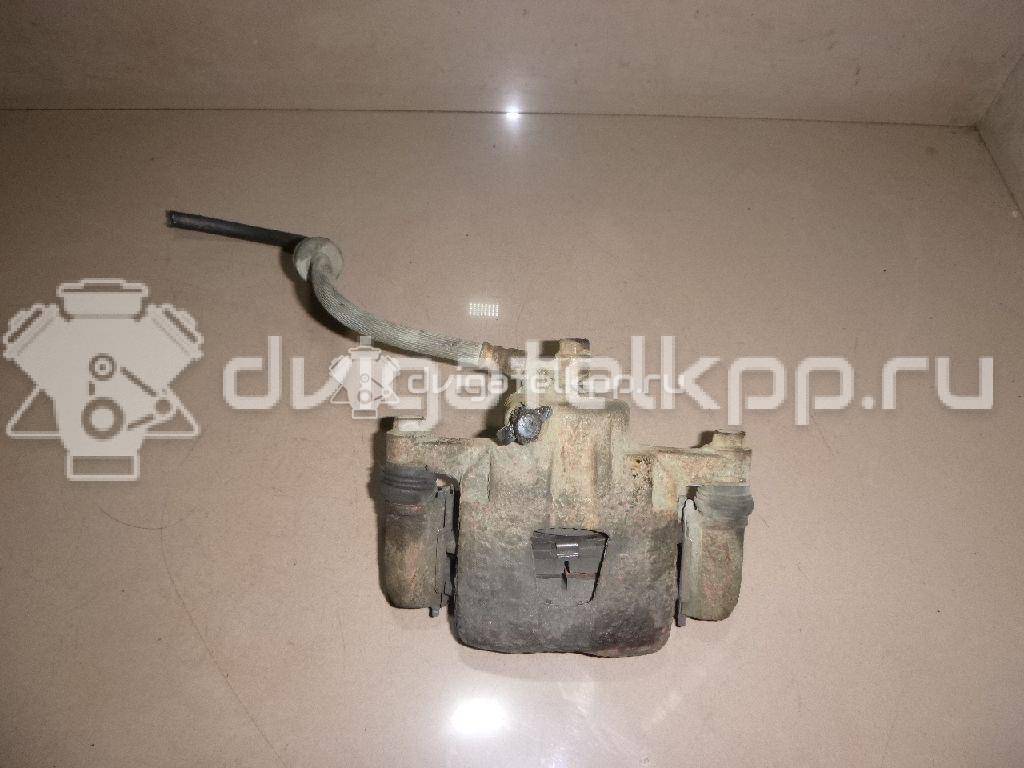 Фото Суппорт тормозной передний правый  96316600 для Chevrolet Spark / Matiz M200, M250 {forloop.counter}}