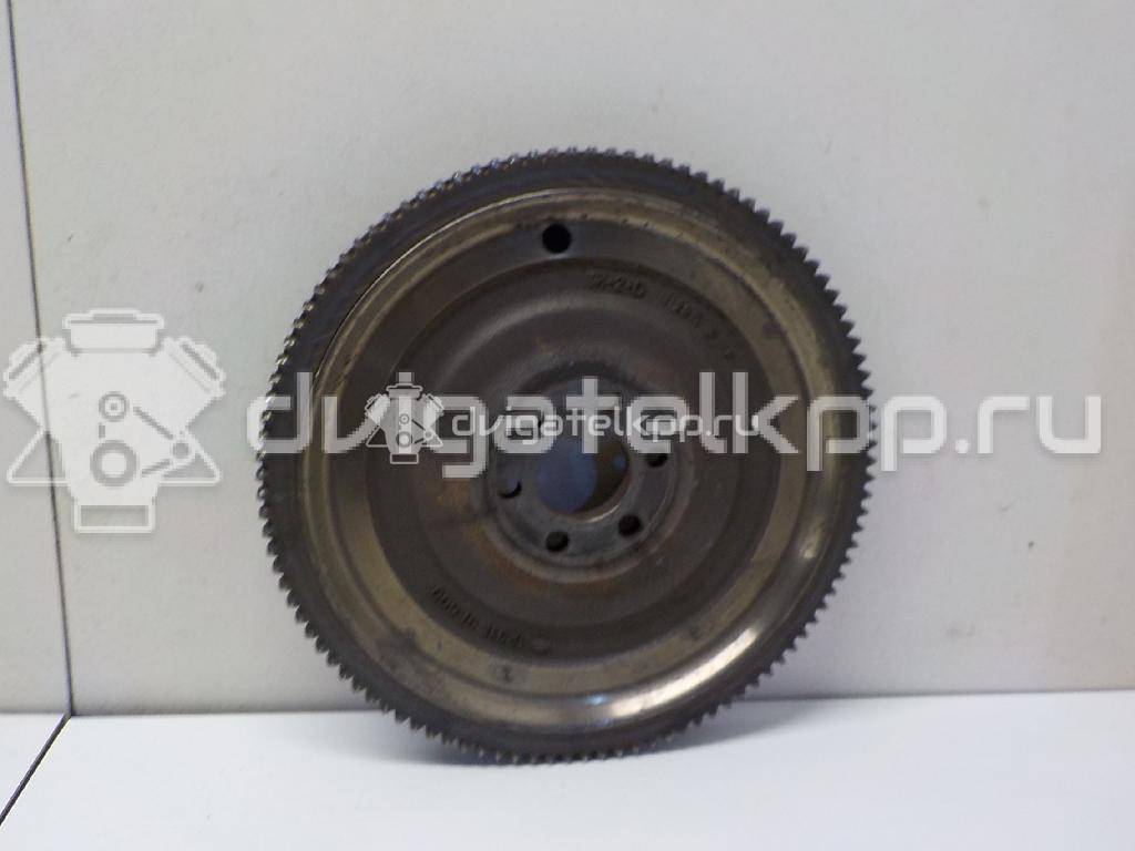 Фото Маховик для двигателя QG16DE для Nissan Sunny / Bluebird / Avenir / Primera / Almera 102-120 л.с 16V 1.6 л бензин 123109F700 {forloop.counter}}