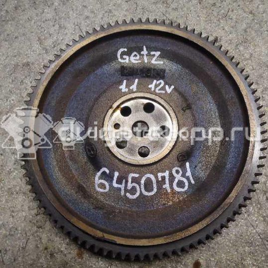 Фото Маховик для двигателя G4HD для Hyundai Atos Mx / Getz Tb 58-67 л.с 12V 1.1 л бензин 2320002800