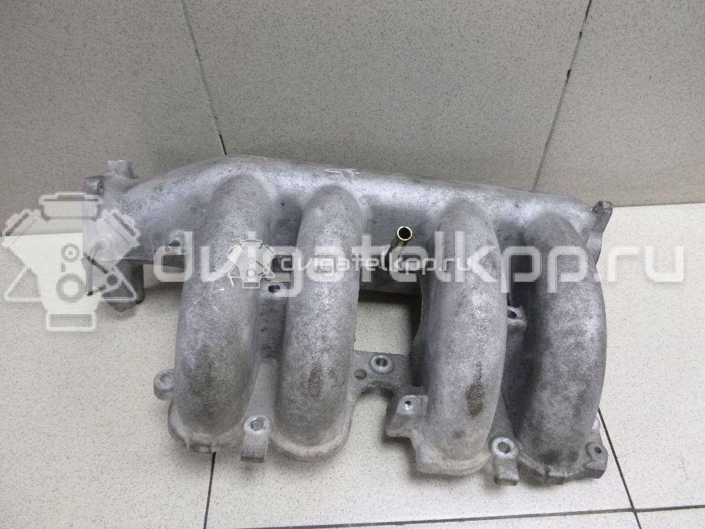 Фото Коллектор впускной для двигателя QR25DE для Nissan (Dongfeng) / Suzuki / Mitsuoka / Nissan 141-182 л.с 16V 2.5 л бензин 14010AE001 {forloop.counter}}