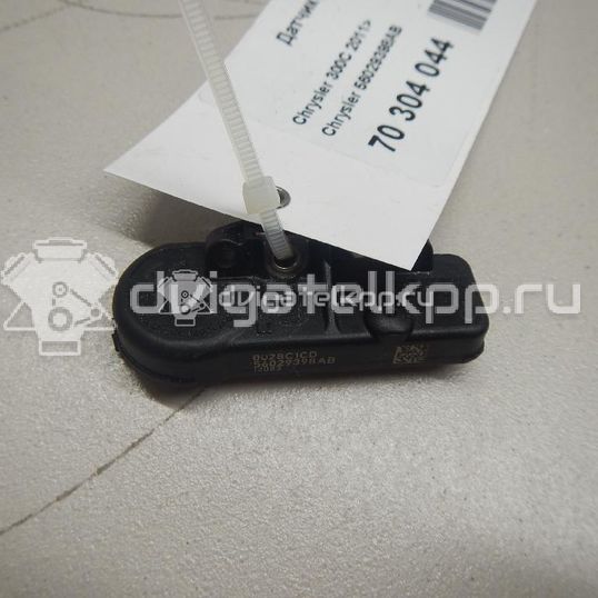 Фото Датчик давления в шине  56029398AB для Jeep Cherokee / Grand Cherokee / Wrangler / Compass / Commander Xk, Xh