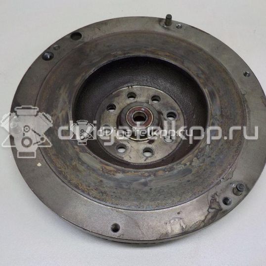 Фото Маховик для двигателя J20A для Maruti Suzuki / Suzuki / Chevrolet / Geo / Maruti 128-132 л.с 16V 2.0 л бензин 1262077EA0