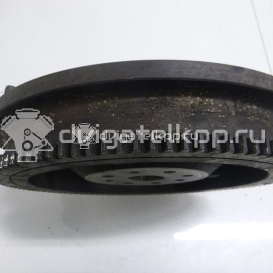 Фото Маховик для двигателя J20A для Maruti Suzuki / Suzuki / Chevrolet / Geo / Maruti 122 л.с 16V 2.0 л бензин 1262077EA0