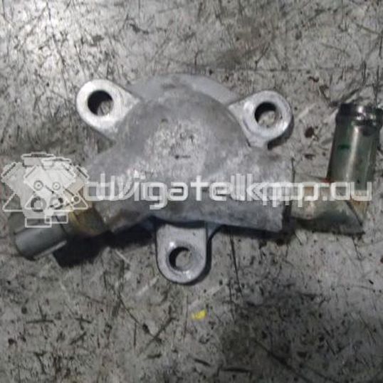 Фото Крышка термостата для двигателя M13A для Subaru / Suzuki / Chevrolet 82-94 л.с 16V 1.3 л бензин 1756080A00