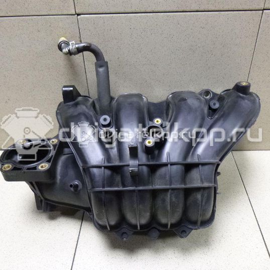 Фото Коллектор впускной для двигателя M13A для Suzuki / Chevrolet 82-94 л.с 16V 1.3 л бензин 1311086G00