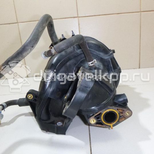 Фото Коллектор впускной для двигателя M13A для Suzuki / Chevrolet 82-94 л.с 16V 1.3 л бензин 1311086G00