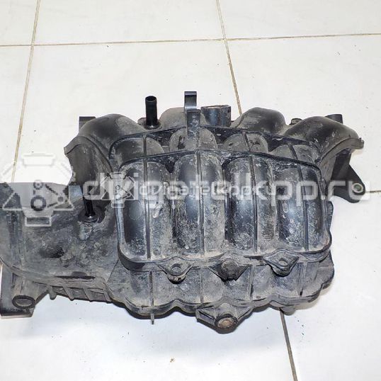 Фото Коллектор впускной для двигателя M13A для Suzuki / Chevrolet 82-94 л.с 16V 1.3 л бензин 1311086G00