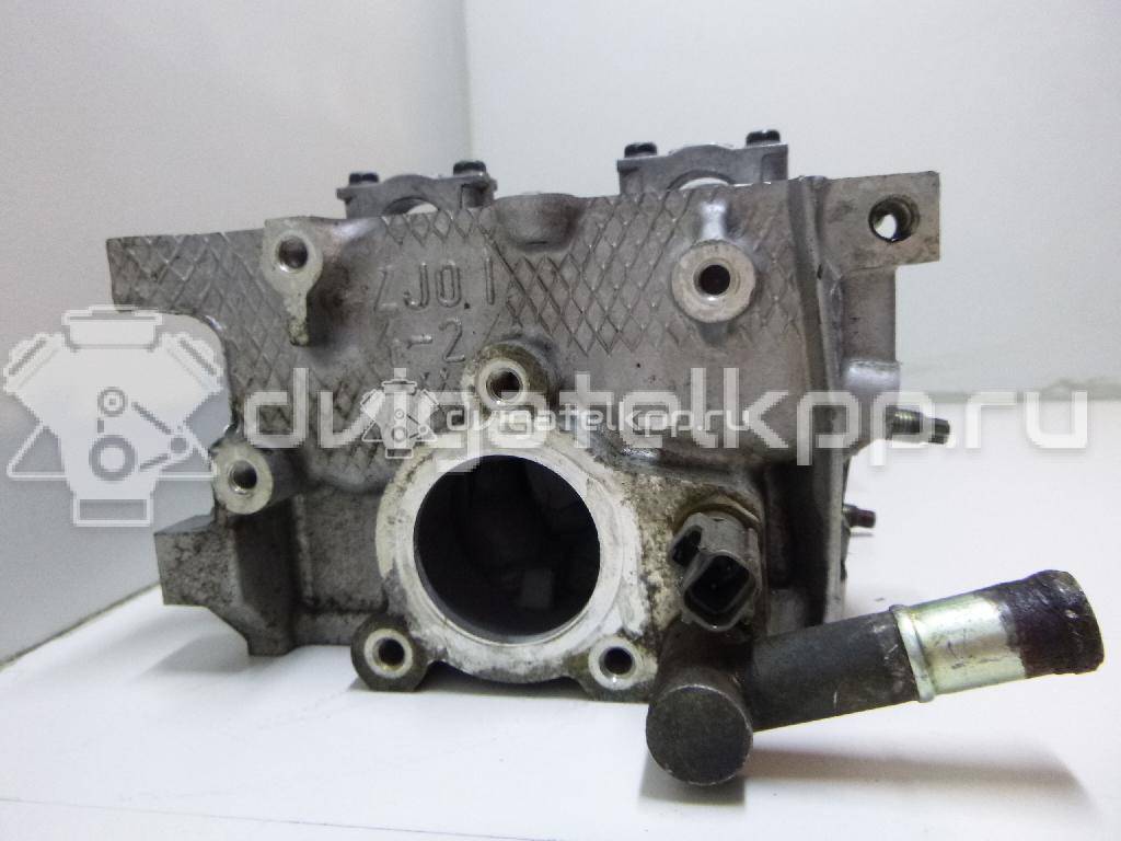 Фото Головка блока для двигателя B6 (DOHC) для Mazda Xedos / 323 107-109 л.с 16V 1.6 л бензин ZJ201001X {forloop.counter}}