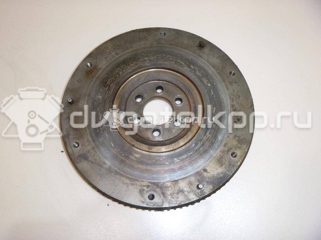 Фото Маховик для двигателя QG16DE для Nissan Sunny / Bluebird / Avenir / Primera / Almera 102-120 л.с 16V 1.6 л бензин 123109F700 {forloop.counter}}