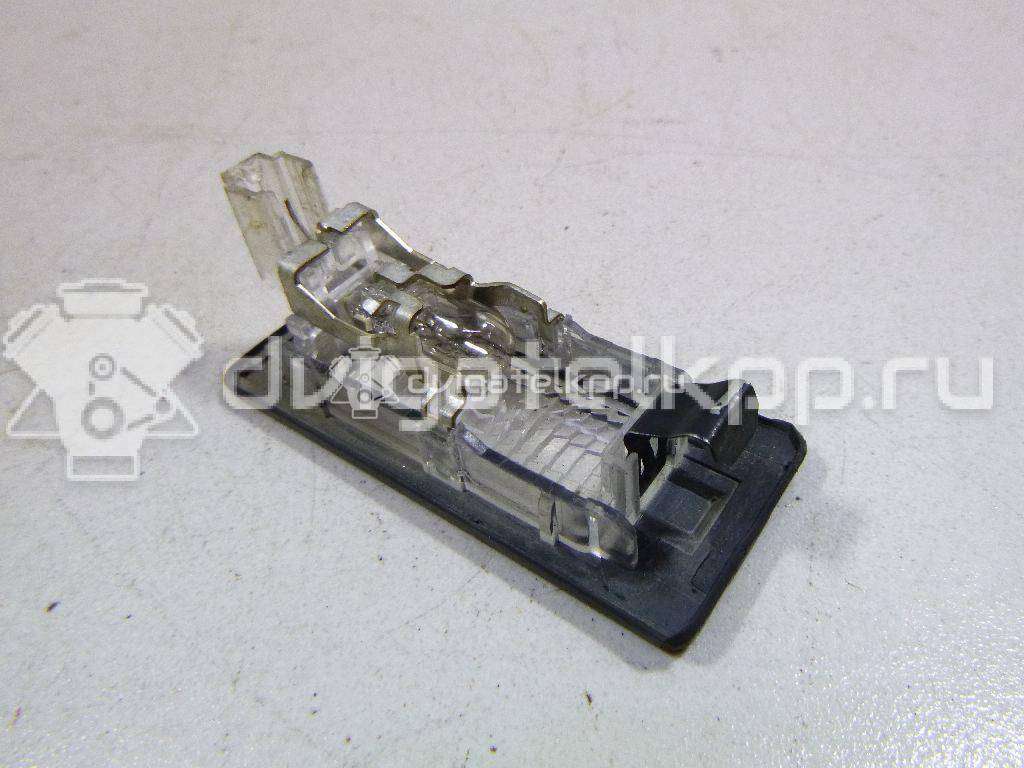 Фото Фонарь подсветки номера  5N0943021B для Volkswagen Tiguan / Touran / Sharan / Touareg / Golf {forloop.counter}}