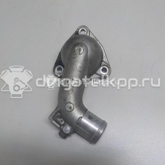 Фото Крышка термостата для двигателя 6G72 (SOHC 24V) для Mitsubishi Magna / Verada / Eclipse / Diamante / Pajero 155-204 л.с 24V 3.0 л бензин MD367779