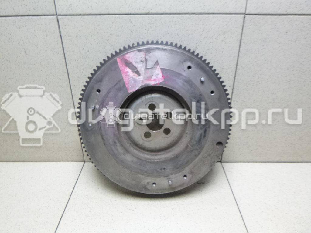 Фото Маховик для двигателя 4G13 (12V) для Mitsubishi Colt / Mirage / Lancer 60-79 л.с 12V 1.3 л бензин MD341315 {forloop.counter}}