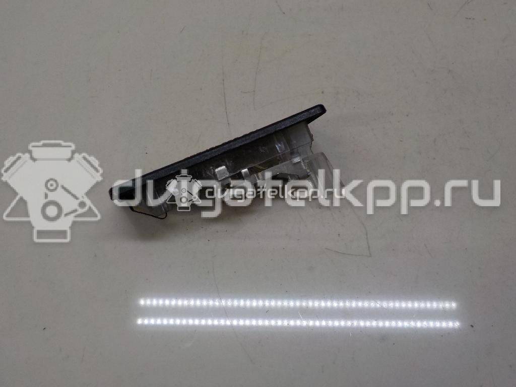 Фото Фонарь подсветки номера  5N0943021 для Seat Ibiza / Alhambra {forloop.counter}}