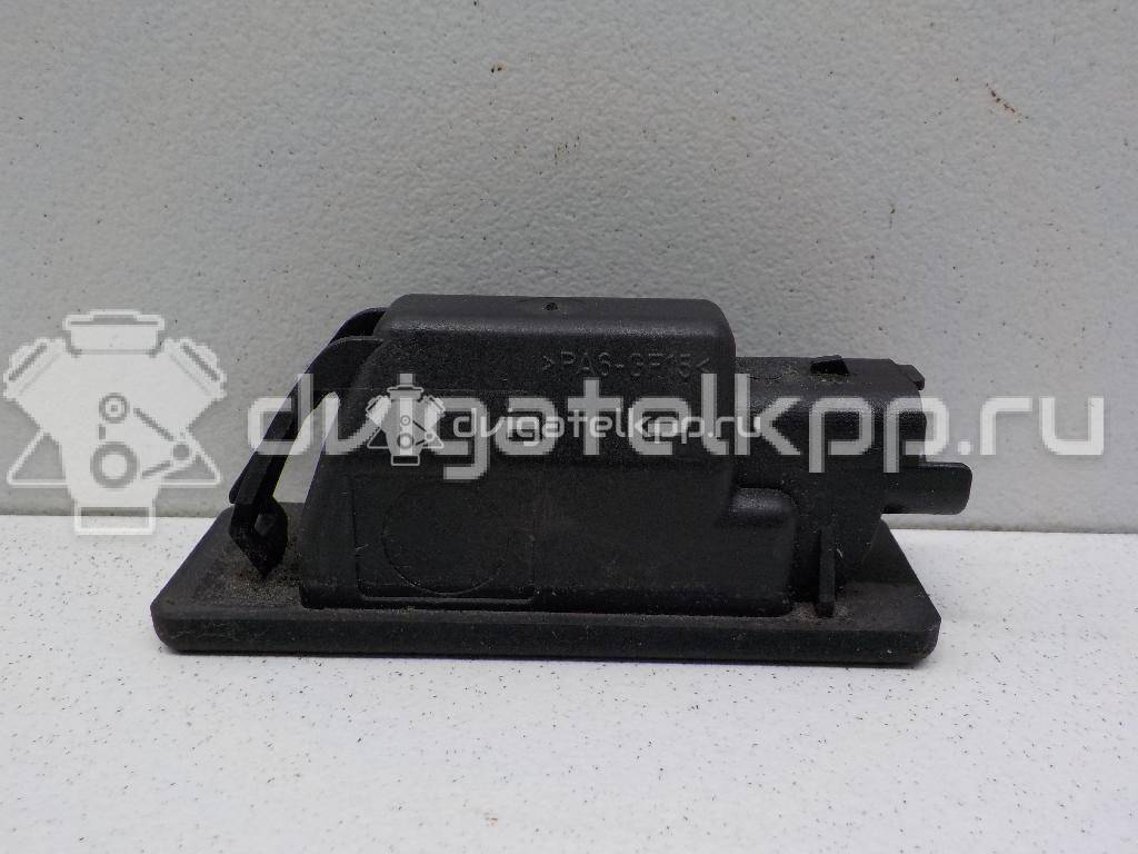 Фото Фонарь подсветки номера  26510AU300 для Nissan Primera / Micra / Note / Nv200 / Np300 {forloop.counter}}