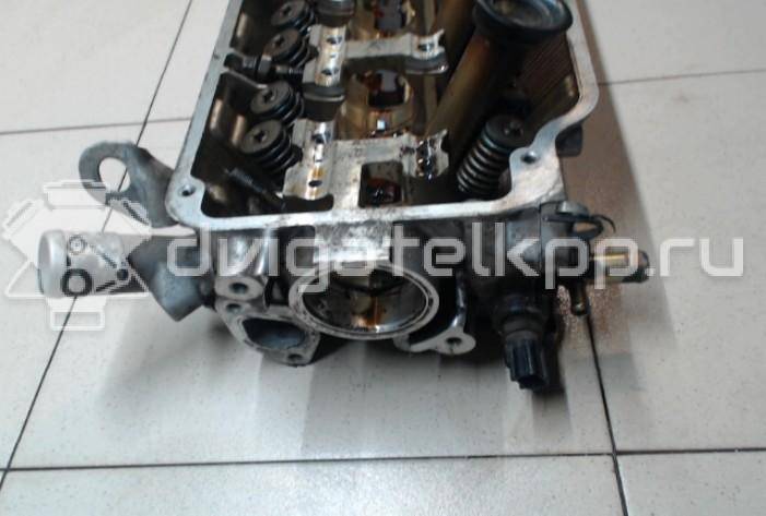 Фото Головка блока для двигателя 4G93 (DOHC 16V) для Mitsubishi Colt / Lancer / Carisma Da / Space 112-156 л.с 16V 1.8 л бензин MD313416 {forloop.counter}}