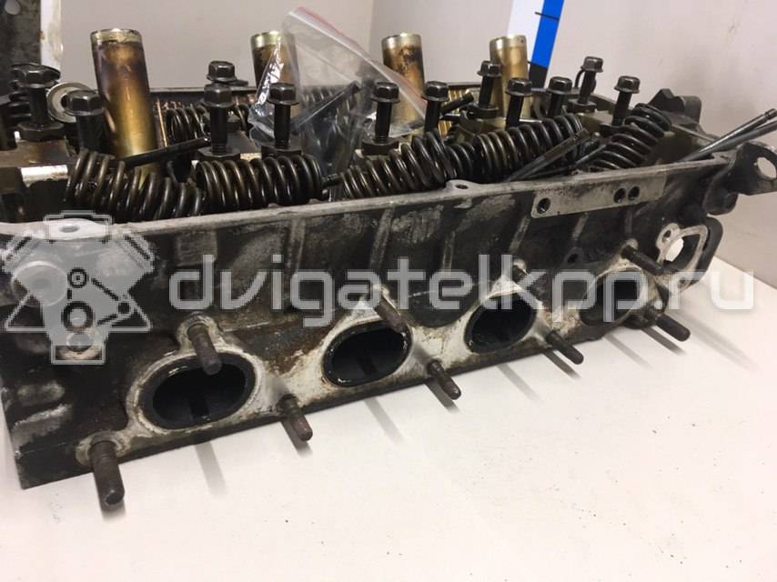 Фото Головка блока для двигателя 4G92 (DOHC 16V) для Mitsubishi Mirage 147-174 л.с 16V 1.6 л бензин MD313416 {forloop.counter}}