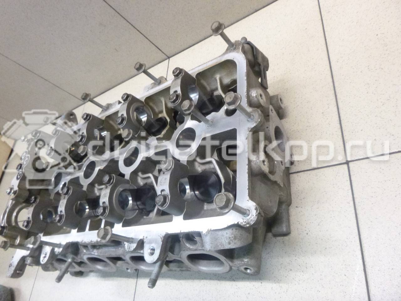 Фото Головка блока для двигателя G4FG для Hyundai / Kia 120-132 л.с 16V 1.6 л бензин 221002B250 {forloop.counter}}