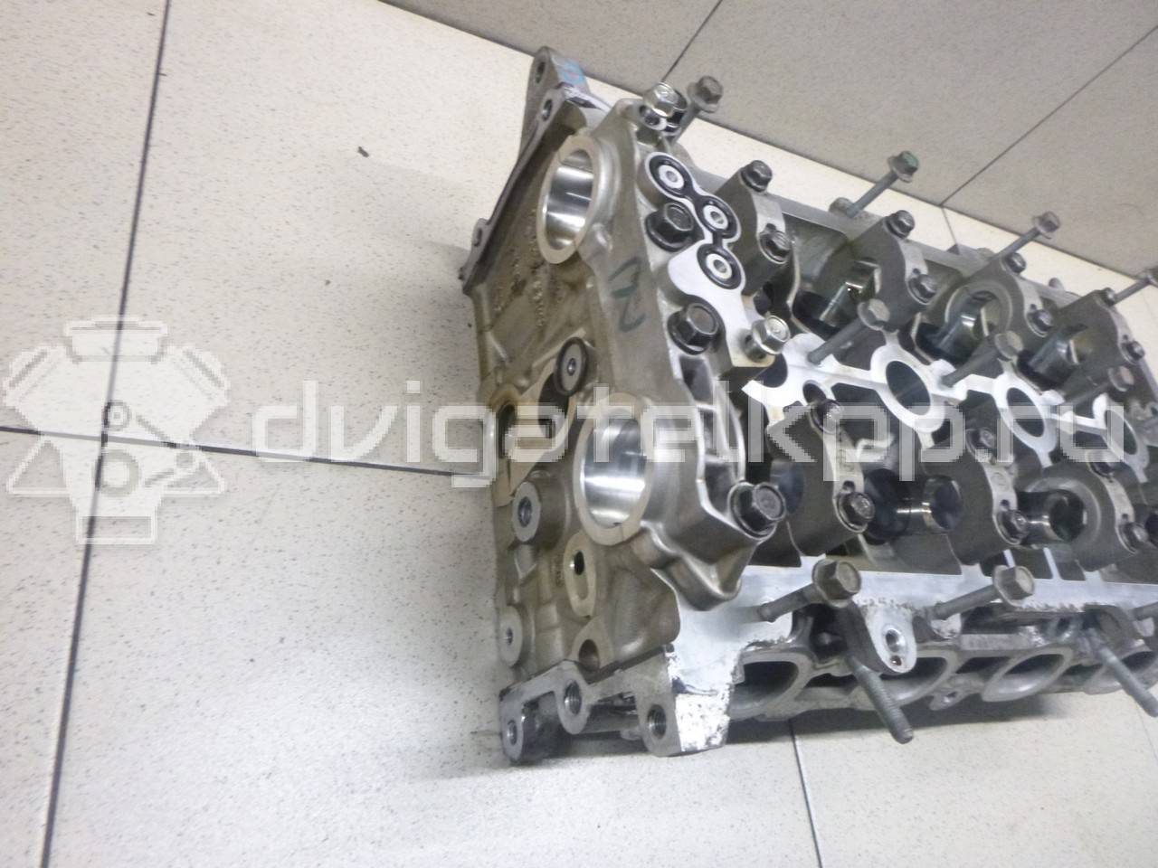 Фото Головка блока для двигателя G4FG для Hyundai / Kia 120-132 л.с 16V 1.6 л бензин 221002B250 {forloop.counter}}