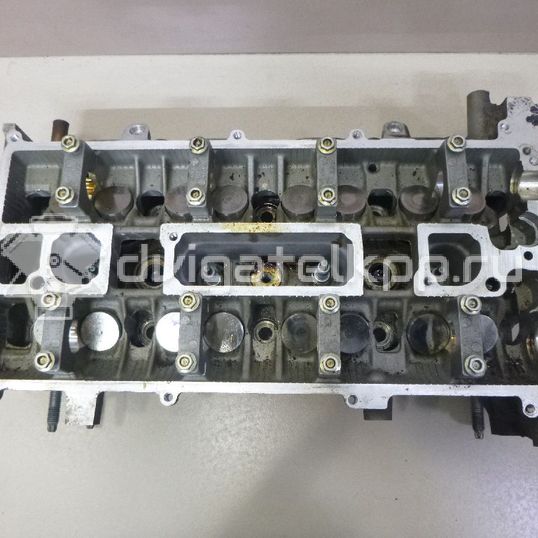 Фото Головка блока для двигателя BP (DOHC) для Mazda / Ford Australia / Eunos 103-125 л.с 16V 1.8 л бензин 5207010