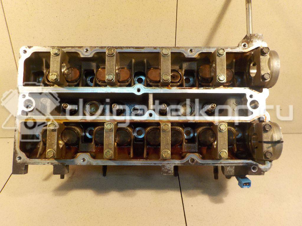 Фото Головка блока для двигателя BP (DOHC) для Mazda / Ford Australia / Eunos 103-125 л.с 16V 1.8 л бензин 1560511 {forloop.counter}}