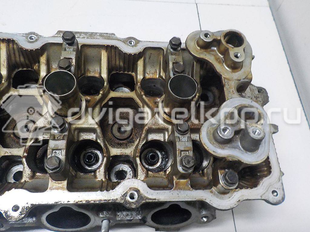 Фото Головка блока для двигателя VQ35DE для Nissan Teana / 350 Z Z33 / Murano / Pathfinder 231-305 л.с 24V 3.5 л бензин 11040JA10A {forloop.counter}}