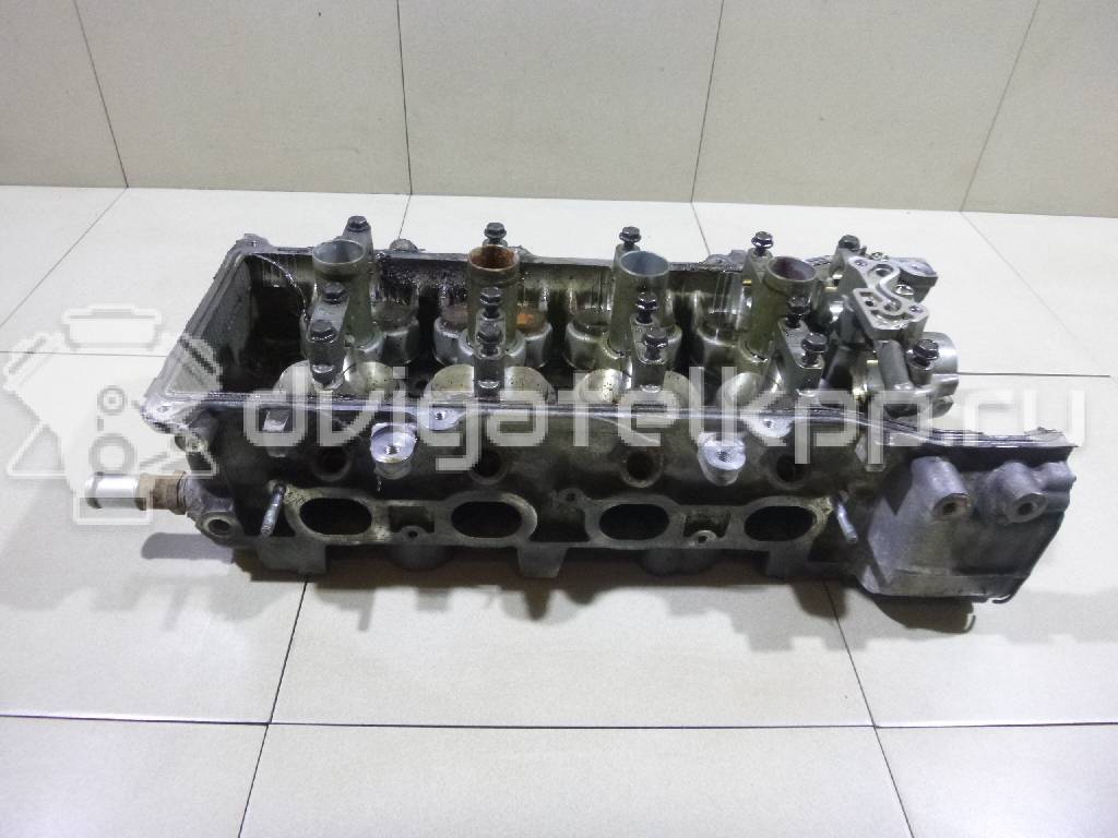 Фото Головка блока для двигателя CR14DE для Nissan Note / Micra 88-98 л.с 16V 1.4 л бензин 11040BX000 {forloop.counter}}