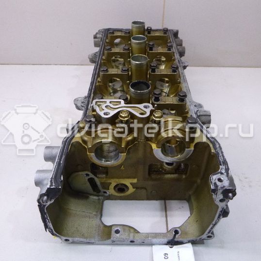 Фото Головка блока для двигателя CR14DE для Nissan Note / Micra 88-98 л.с 16V 1.4 л бензин 11040BX000