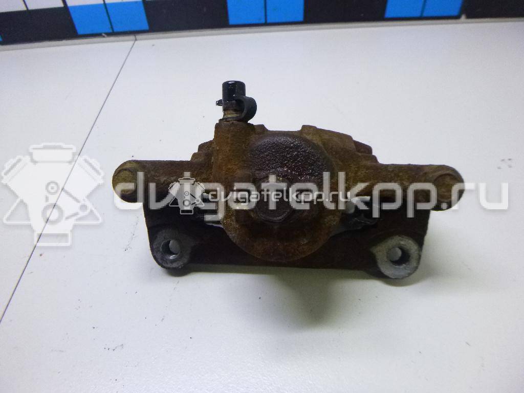 Фото Суппорт тормозной передний левый  96426039 для Chevrolet Spark / Matiz M200, M250 {forloop.counter}}