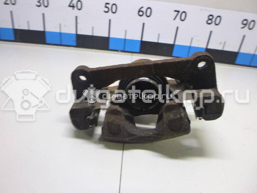 Фото Суппорт тормозной передний правый  96426040 для Chevrolet Spark / Matiz M200, M250 {forloop.counter}}