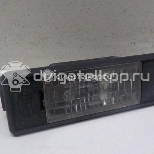 Фото Фонарь подсветки номера  26510AU300 для Nissan Primera / Micra / Note / Nv200 / Np300