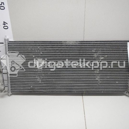 Фото Радиатор кондиционера (конденсер)  92100BM407 для Nissan Primera / Almera