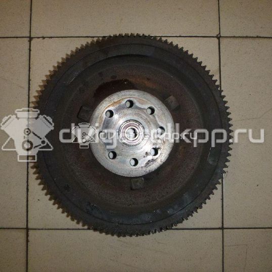 Фото Маховик для двигателя J20A для Maruti Suzuki / Suzuki / Chevrolet / Geo / Maruti 128-147 л.с 16V 2.0 л бензин 1262077EA0