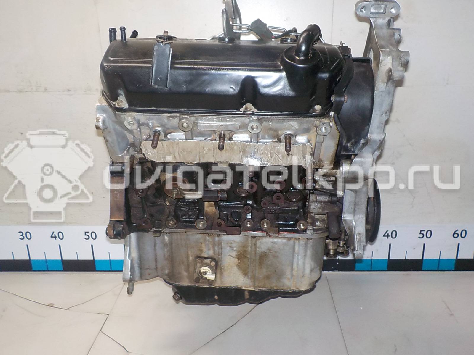 Фото Контрактный (б/у) двигатель 6G72 (DOHC 24V) для Mitsubishi / Hyundai 197-224 л.с 24V 3.0 л бензин MD975973 {forloop.counter}}