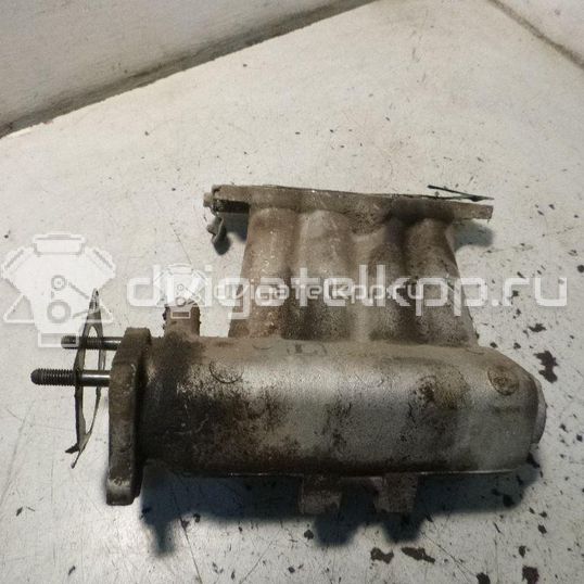 Фото Коллектор впускной для двигателя G4HG для Hyundai / Kia 65 л.с 12V 1.1 л бензин