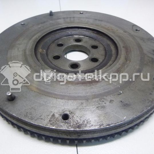 Фото Маховик для двигателя QG16DE для Nissan Sunny / Bluebird / Avenir / Primera / Almera 102-120 л.с 16V 1.6 л бензин 123119F600