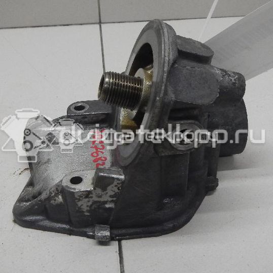 Фото Кронштейн масляного фильтра  06A115405BT для Audi / Seat