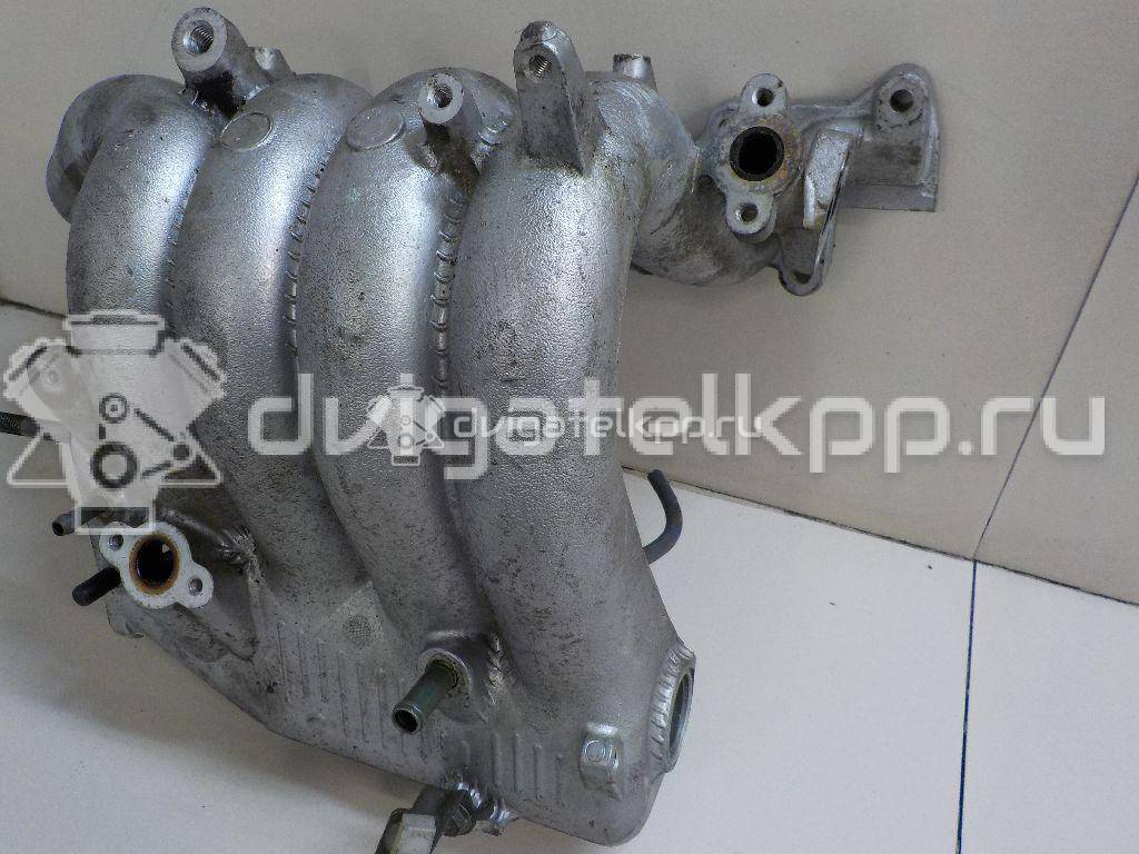 Фото Коллектор впускной для двигателя J20A для Maruti Suzuki / Suzuki / Chevrolet / Geo / Maruti 128-147 л.с 16V 2.0 л бензин 1311065D20 {forloop.counter}}