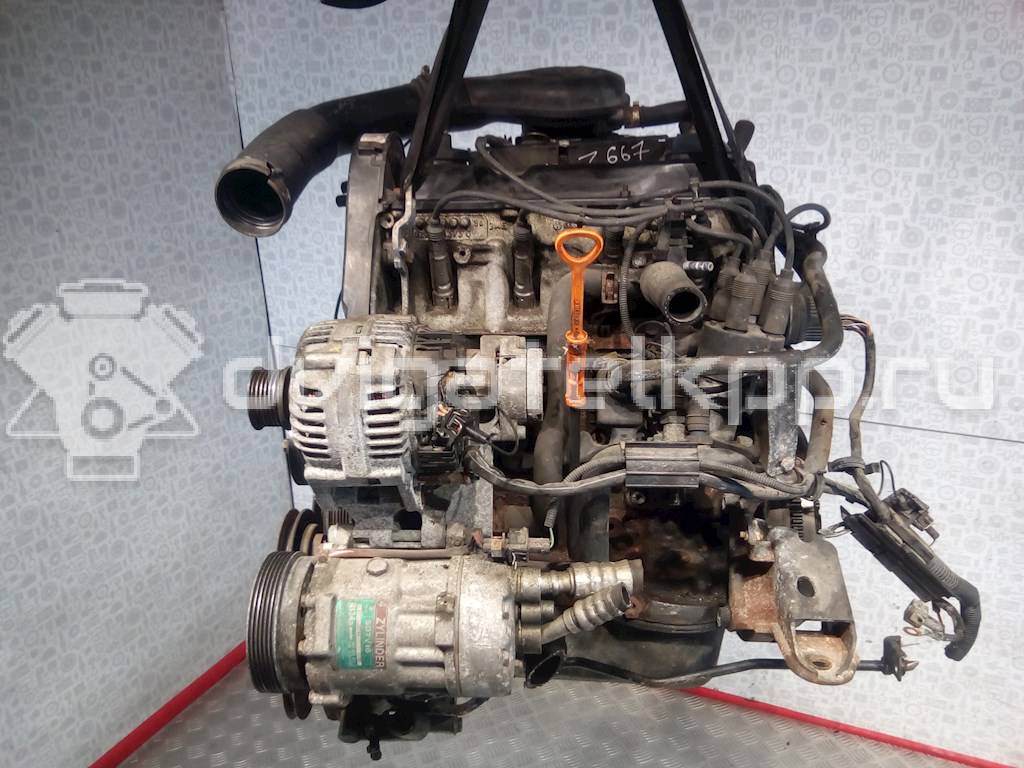 Фото Контрактный (б/у) двигатель AAM для Volkswagen Passat / Vento 1H2 / Golf 75 л.с 8V 1.8 л бензин {forloop.counter}}