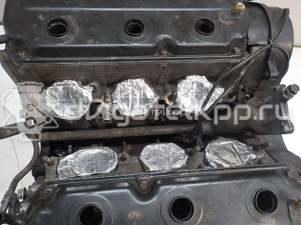 Фото Контрактный (б/у) двигатель 6G72 (SOHC 24V) для Mitsubishi Pajero 155-204 л.с 24V 3.0 л бензин MD367372 {forloop.counter}}