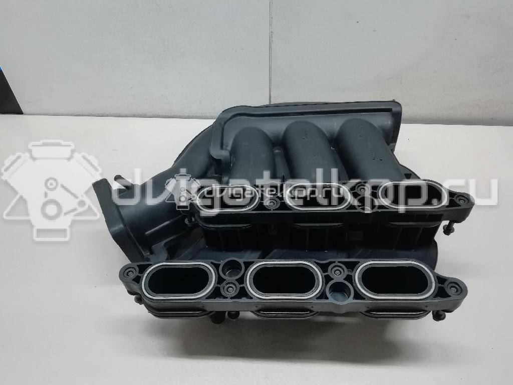 Фото Коллектор впускной для двигателя B6 (DOHC) для Mazda Xedos / 323 107-109 л.с 16V 1.6 л бензин YL8E9424CD {forloop.counter}}