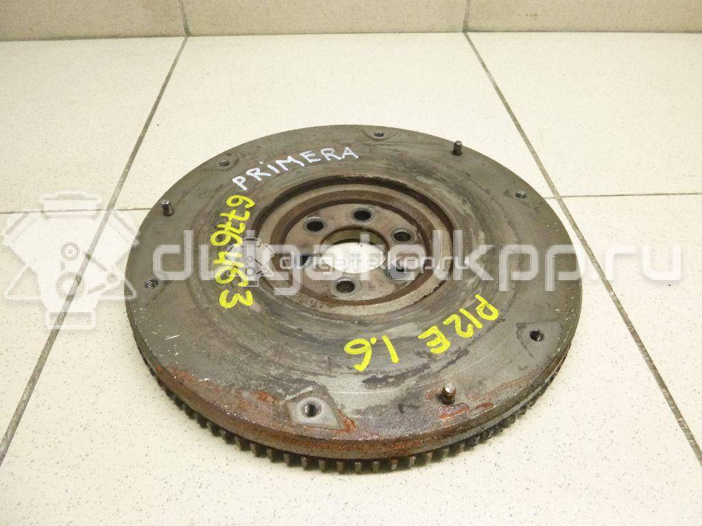 Фото Маховик для двигателя QG16DE для Nissan Sunny / Bluebird / Avenir / Primera / Almera 102-120 л.с 16V 1.6 л бензин 123119F600 {forloop.counter}}