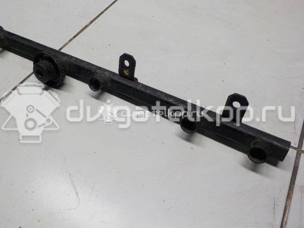 Фото Рейка топливная (рампа) для двигателя ERH для Jeep Cherokee / Grand Cherokee / Wrangler 170-199 л.с 12V 4.0 л бензин 05014496AA {forloop.counter}}