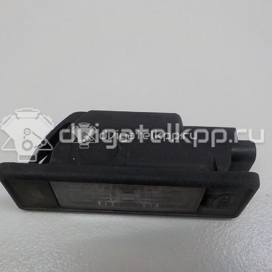 Фото Фонарь подсветки номера  26510AU300 для Nissan Primera / Micra / Note / Nv200 / Np300