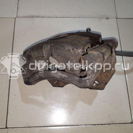 Фото Суппорт тормозной передний левый  410114U100 для Nissan 200 Sx / Primera / Almera