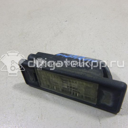 Фото Фонарь подсветки номера  26510AU300 для Nissan Primera / Micra / Note / Nv200 / Np300