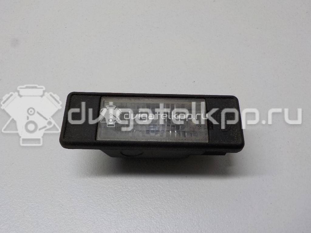 Фото Фонарь подсветки номера  26510AU300 для Nissan Primera / Micra / Note / Nv200 / Np300 {forloop.counter}}