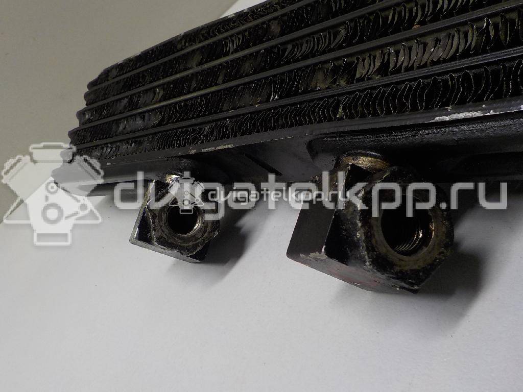 Фото Радиатор масляный для двигателя 6G74 (DOHC 24V) для Mitsubishi Proudia Dignity S4 A, S3 A / Pajero 184-260 л.с 24V 3.5 л бензин MR404903 {forloop.counter}}