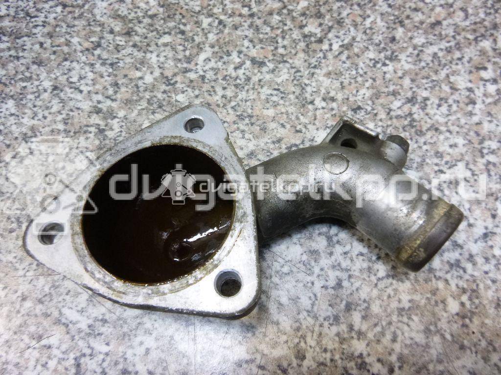 Фото Крышка термостата для двигателя 6G72 (DOHC 24V) для Mitsubishi Sigma / 3000 Gt Z1 A / Galant 143-286 л.с 24V 3.0 л бензин MD367779 {forloop.counter}}